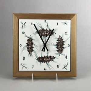 pine cone 9" x 9" framed clock Maine made pottery